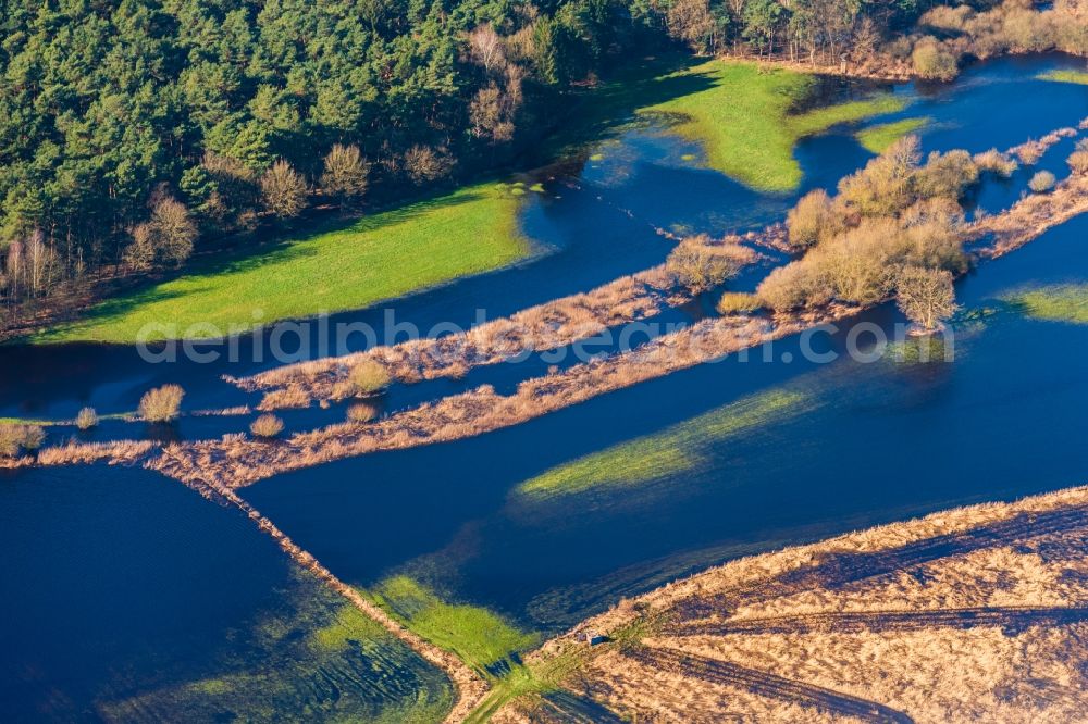 Sandbostel from above - Riparian areas and flooded flood meadows due to a river bed leading to flood levels Oste in Sandbostel in the state Lower Saxony, Germany