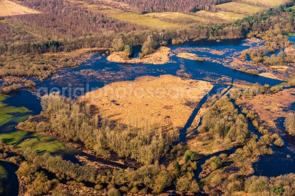 Sandbostel from above - Riparian areas and flooded flood meadows due to a river bed leading to flood levels Oste in Sandbostel in the state Lower Saxony, Germany