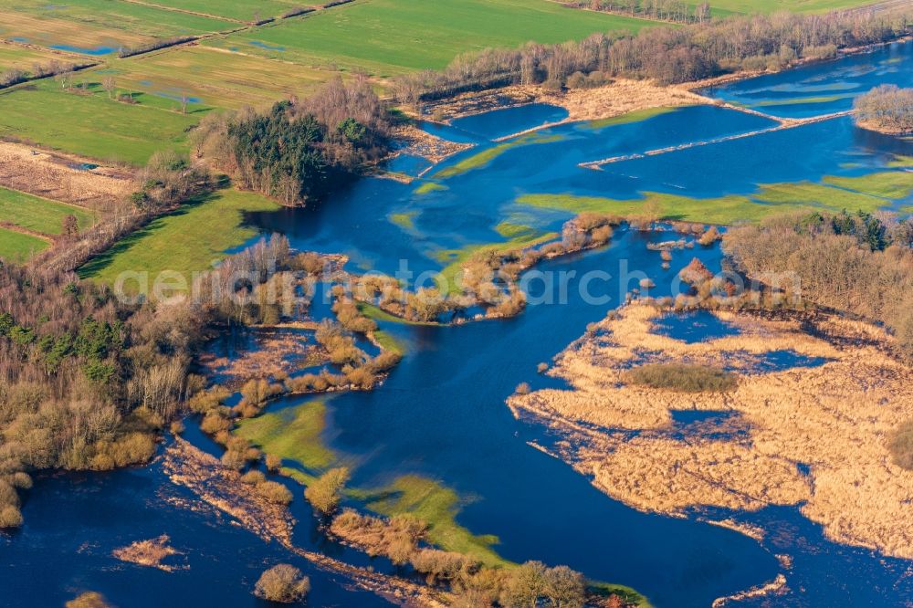 Sandbostel from above - Riparian areas and flooded flood meadows due to a river bed leading to flood levels Oste in Sandbostel in the state Lower Saxony, Germany