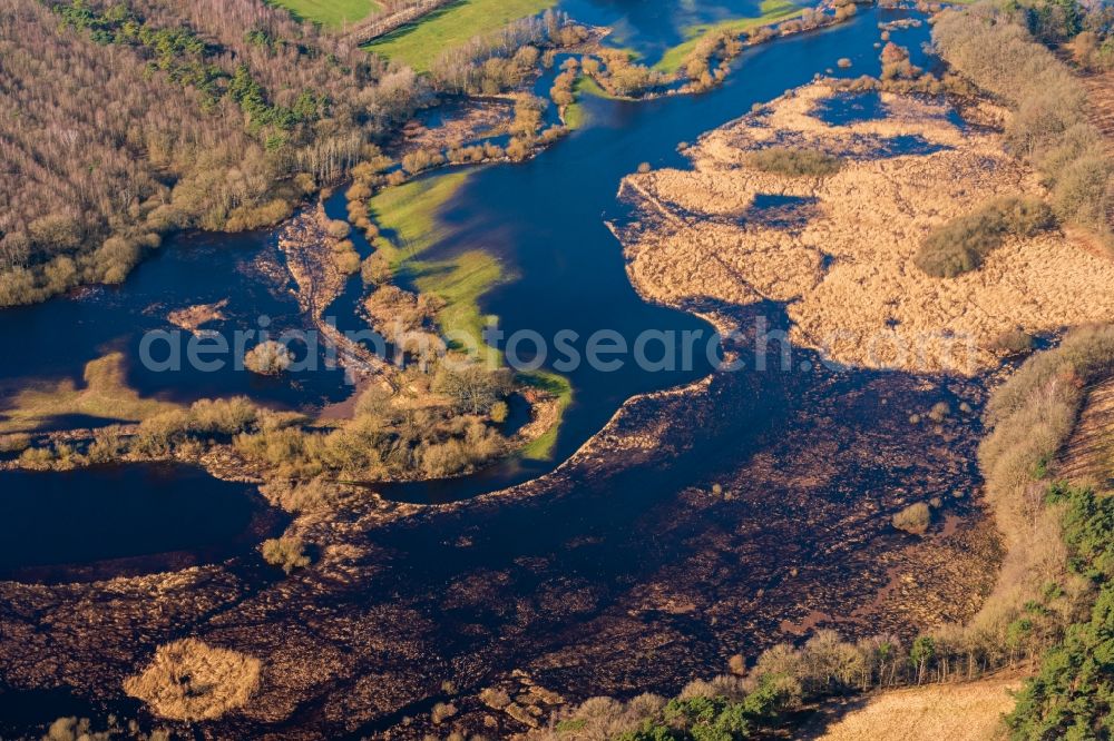 Aerial photograph Sandbostel - Riparian areas and flooded flood meadows due to a river bed leading to flood levels Oste in Sandbostel in the state Lower Saxony, Germany