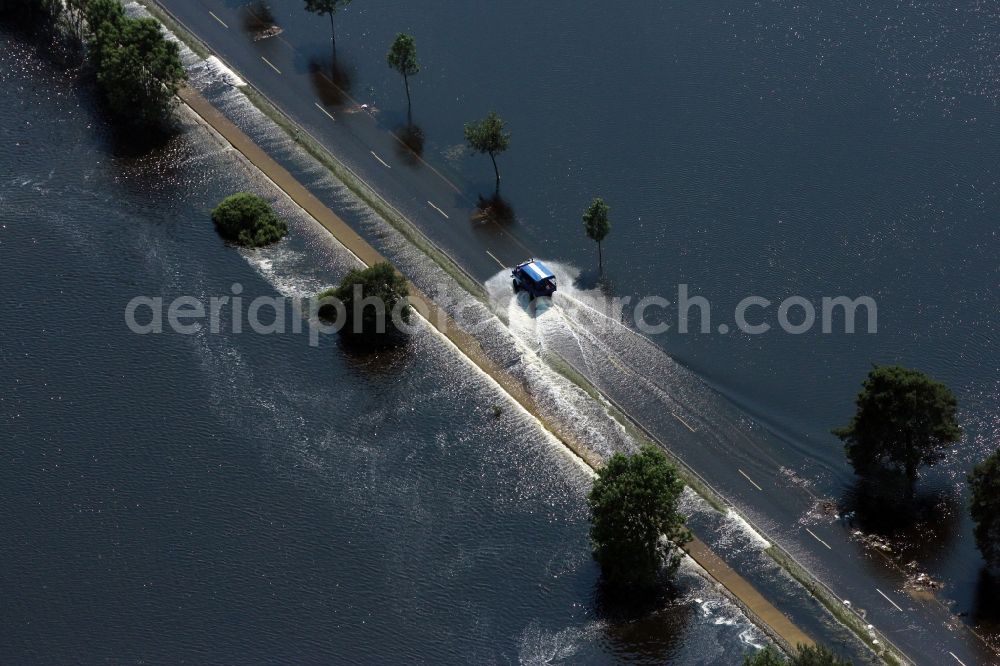 Havelberg from the bird's eye view: Riparian areas and flooded flood meadows due to a river bed leading to flood levels of Unteren Havel in Havelberg in the state Saxony-Anhalt, Germany