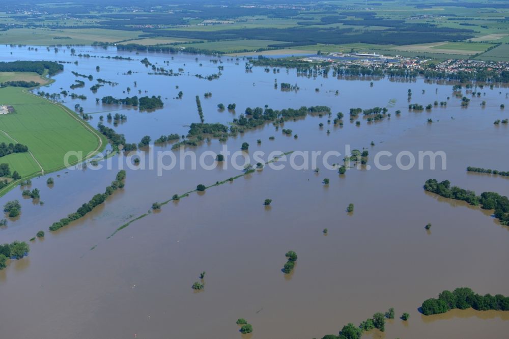 Schützberg from the bird's eye view: Flooded landscape with flood level - situation by flooding, dam failure, and crossing the River Elbe at Schützberg in Saxony-Anhalt