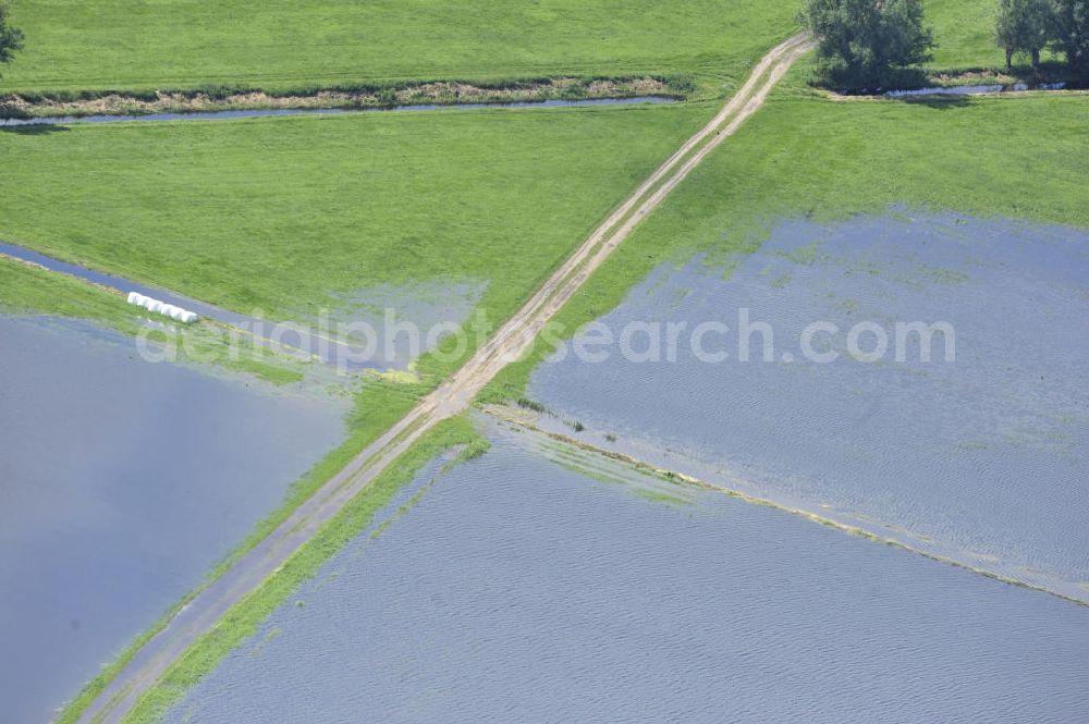 Aerial photograph Poggelow - Überflutung von Wiesen bei einem Melorationsgraben in Mecklenburg-Vorpommern. Flooding of meadows at a melioration trench in Mecklenburg-Western Pomerania.