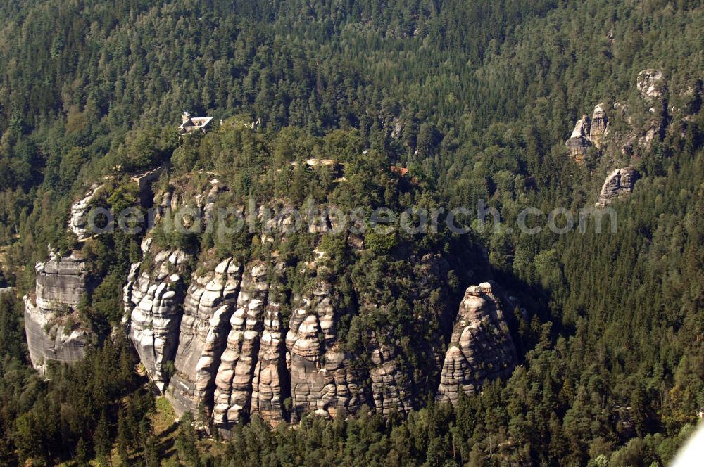 Oybin from the bird's eye view: Der Oybin ist ein Berg des Zittauer Gebirges (514 m) oberhalb des gleichnamigen Ortes mit den Ruinen der Burg Oybin, die Kaiser Karl IV. zu seinem Alterssitz ausbauen ließ, und eines Klosters der Cölestiner, das 1369 gegründet worden ist. Kontakt Burg und Kloster Oybin: Tel. +49(0)35844 73313, Email: info@burgundkloster-oybin.de