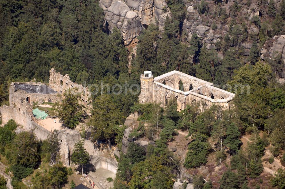 Aerial photograph Oybin - Der Oybin ist ein Berg des Zittauer Gebirges (514 m) oberhalb des gleichnamigen Ortes mit den Ruinen der Burg Oybin, die Kaiser Karl IV. zu seinem Alterssitz ausbauen ließ, und eines Klosters der Cölestiner, das 1369 gegründet worden ist. Kontakt Burg und Kloster Oybin: Tel. +49(0)35844 73313, Email: info@burgundkloster-oybin.de