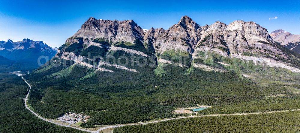 Saskatchewan River Crossing from the bird's eye view: Valley landscape surrounded by mountains Saskatchewan River Crossing in Canadian Rocky Mountains on street Icefields Parkway in Saskatchewan River Crossing in Alberta, Canada