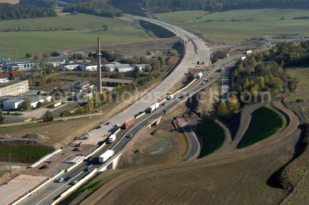 Aerial photograph Eisenach - Blick auf die Baustelle des Übergang der alten A4 auf die neue A4 nahe der neuen Anschlussstelle Eisenach-West. Der Neubau ist Teil des Projekt Nordverlegung / Umfahrung Hörselberge der Autobahn E40 / A4 in Thüringen bei Eisenach. Durchgeführt werden die im Zuge dieses Projektes notwendigen Arbeiten unter an derem von den Mitarbeitern der Niederlassung Weimar der EUROVIA Verkehrsbau Union sowie der Niederlassungen Abbruch und Erdbau, Betonstraßenbau, Ingenieurbau und TECO Schallschutz der EUROVIA Beton sowie der DEGES.