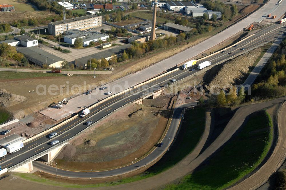 Eisenach from the bird's eye view: Blick auf die Baustelle des Übergang der alten A4 auf die neue A4 nahe der neuen Anschlussstelle Eisenach-West. Der Neubau ist Teil des Projekt Nordverlegung / Umfahrung Hörselberge der Autobahn E40 / A4 in Thüringen bei Eisenach. Durchgeführt werden die im Zuge dieses Projektes notwendigen Arbeiten unter an derem von den Mitarbeitern der Niederlassung Weimar der EUROVIA Verkehrsbau Union sowie der Niederlassungen Abbruch und Erdbau, Betonstraßenbau, Ingenieurbau und TECO Schallschutz der EUROVIA Beton sowie der DEGES.