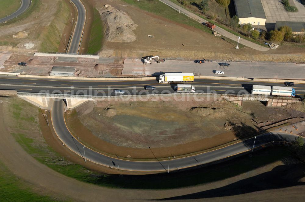 Aerial photograph Eisenach - Blick auf die Baustelle des Übergang der alten A4 auf die neue A4 nahe der neuen Anschlussstelle Eisenach-West. Der Neubau ist Teil des Projekt Nordverlegung / Umfahrung Hörselberge der Autobahn E40 / A4 in Thüringen bei Eisenach. Durchgeführt werden die im Zuge dieses Projektes notwendigen Arbeiten unter an derem von den Mitarbeitern der Niederlassung Weimar der EUROVIA Verkehrsbau Union sowie der Niederlassungen Abbruch und Erdbau, Betonstraßenbau, Ingenieurbau und TECO Schallschutz der EUROVIA Beton sowie der DEGES.