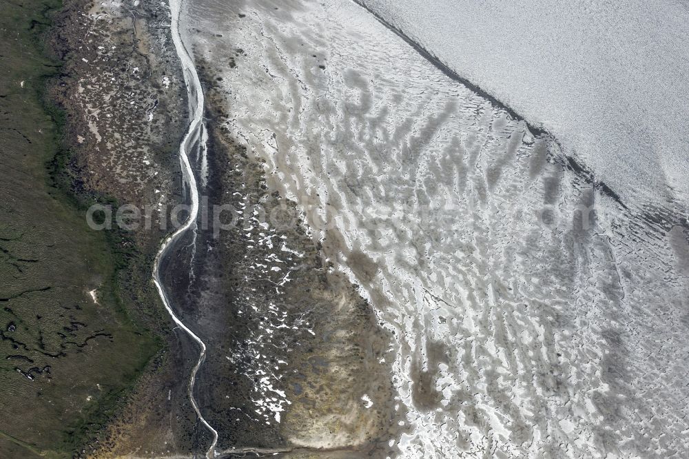 Westerhever from the bird's eye view: Crossing between salt meadows and sandy bank to the west Westerhever in the federal state Schleswig-Holstein