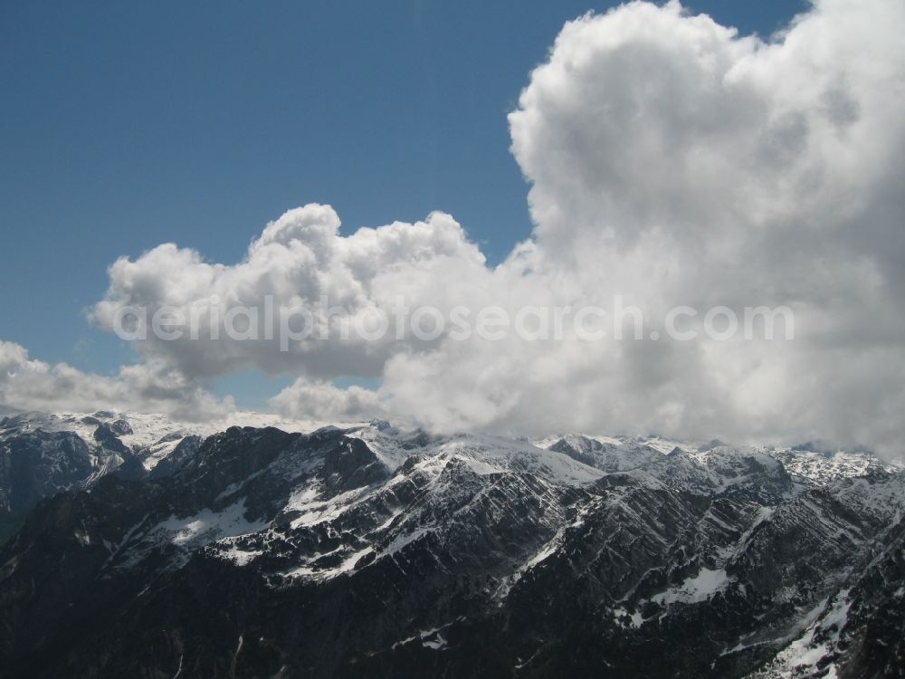 Saalfelden am Steinernen Meer from above - Mountains and cloud formation in Saalfelden Austria