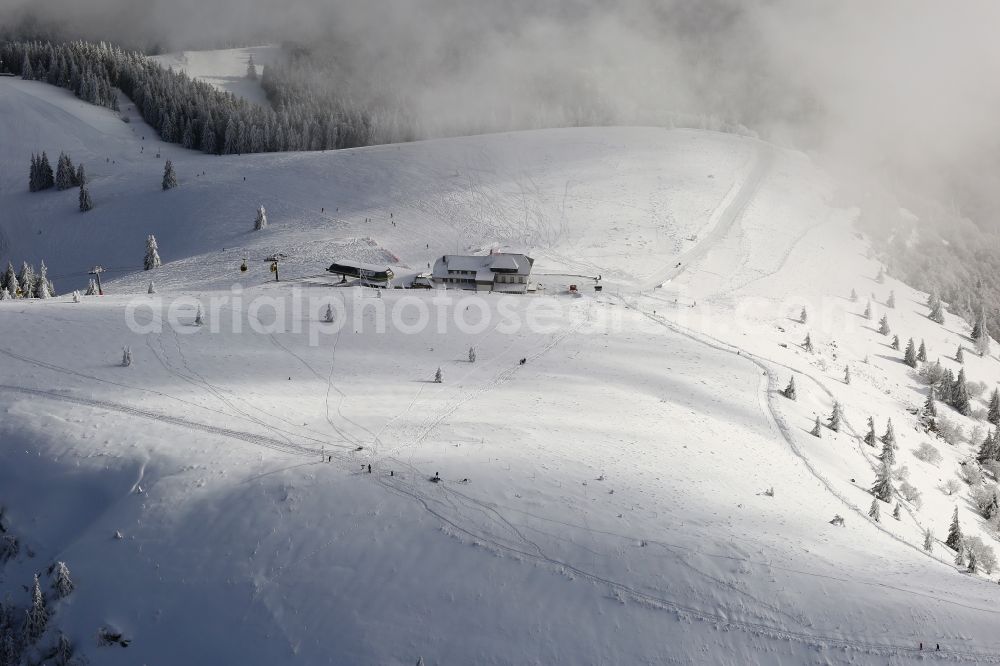 Schönenberg from the bird's eye view: Snow-covered peak of Belchen in the Black Forest in Schoenau in the state of Baden- Wuerttemberg . The Belchen house can only be reached on foot or by the Belchen cableway