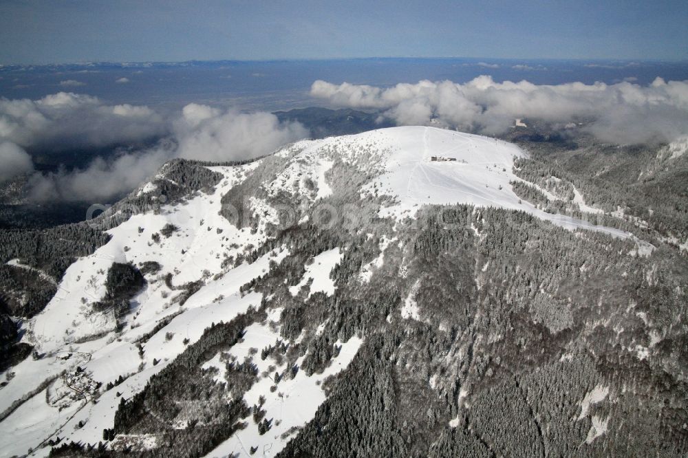 Aerial image Aitern - Snow covered summit of the mountain Belchen in the Black Forest in Aitern in the state Baden-Wuerttemberg