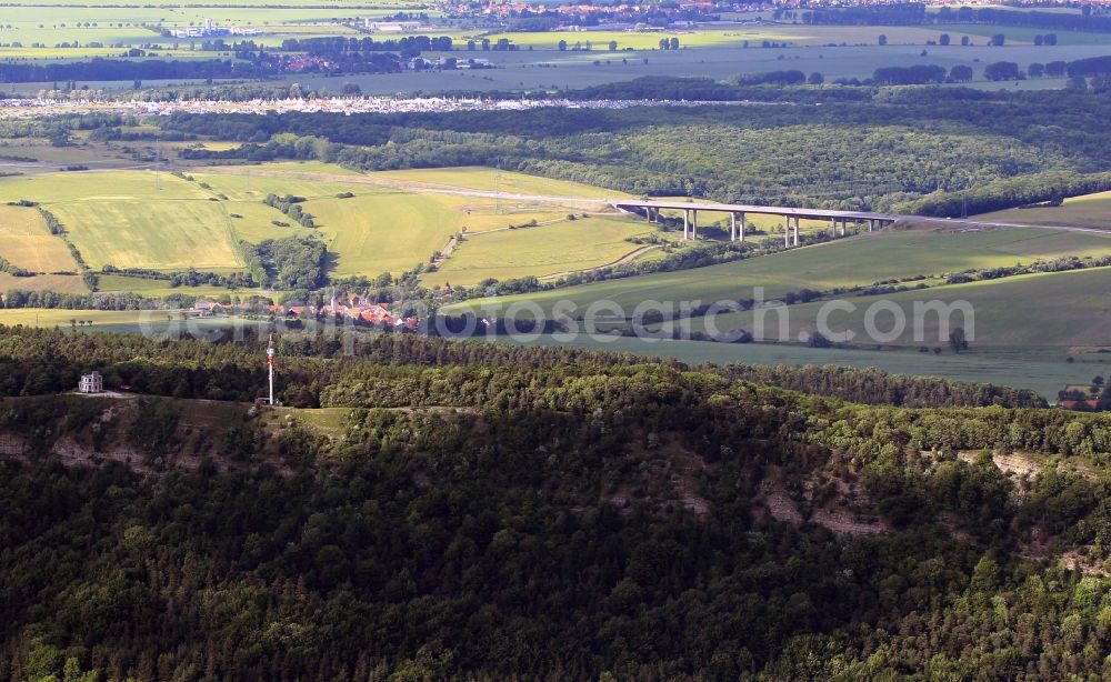 Aerial image Hörselberg-Hainich - The Hoerselberg is a ridge at the southern edge of the Thuringian Basin near the town Hoerselberg-Hainich. On the Great Hoerselberg a mountain inn is a destination near a radio mast. In the background the newly created route of the motorway A4 can be seen