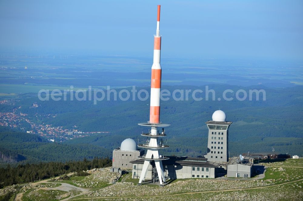 Aerial image Brocken - View of the mountain peak of the Brocken in the Harz - Mountains in the state of Saxony-Anhalt. The rock band the Brocken is designated as a national park and nature reserve. The radio and transmitter towers of Deutsche Telekom are visible from afar .