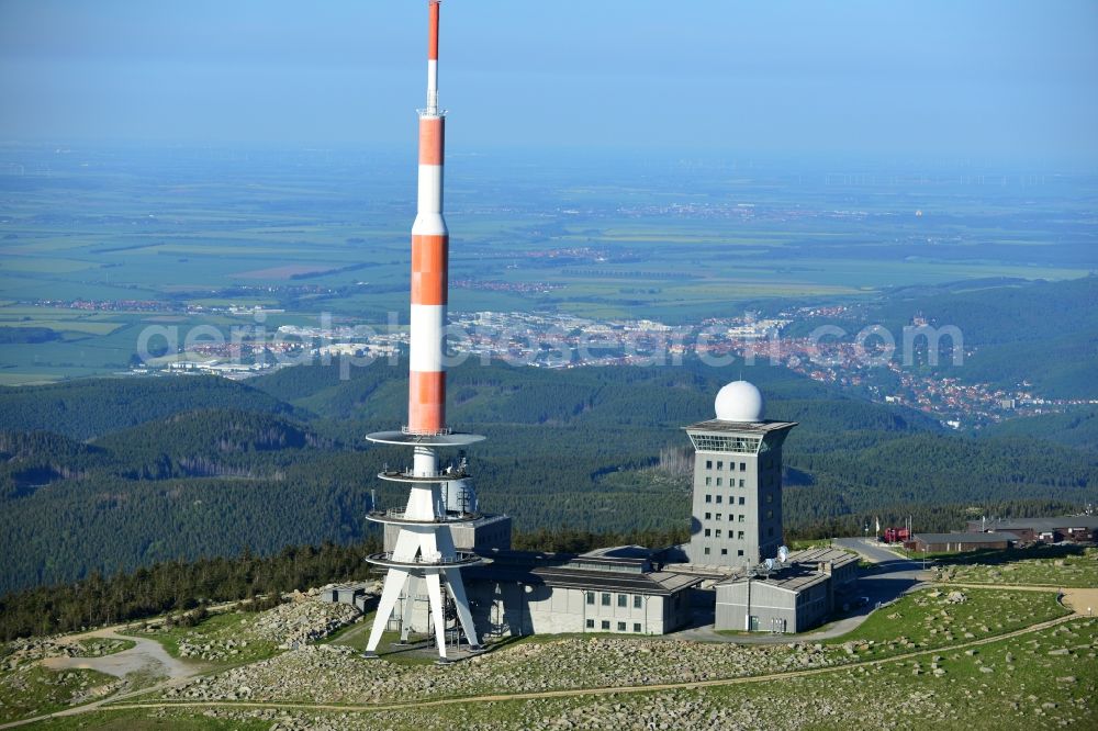 Brocken from the bird's eye view: View of the mountain peak of the Brocken in the Harz - Mountains in the state of Saxony-Anhalt. The rock band the Brocken is designated as a national park and nature reserve. The radio and transmitter towers of Deutsche Telekom are visible from afar .