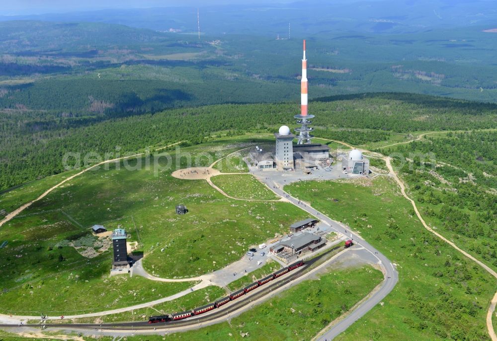 Aerial photograph Brocken - View of the mountain peak of the Brocken in the Harz - Mountains in the state of Saxony-Anhalt. The rock band the Brocken is designated as a national park and nature reserve. The radio and transmitter towers of Deutsche Telekom are visible from afar 