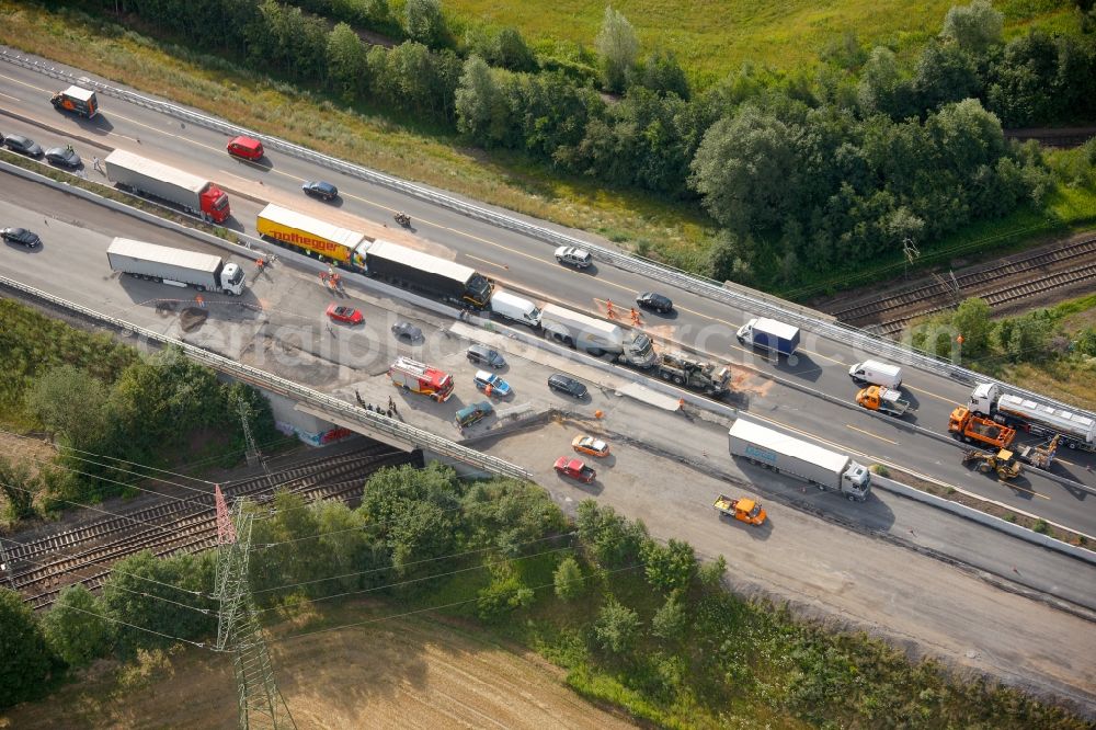 Aerial photograph Hamm Rhynern - Salvage and cleanup after a truck - collision on the motorway A2 motorway in Hamm Rhynern in North Rhine-Westphalia