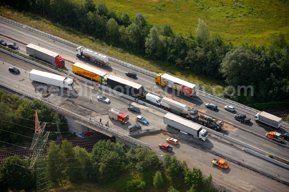 Aerial photograph Hamm Rhynern - Salvage and cleanup after a truck - collision on the motorway A2 motorway in Hamm Rhynern in North Rhine-Westphalia