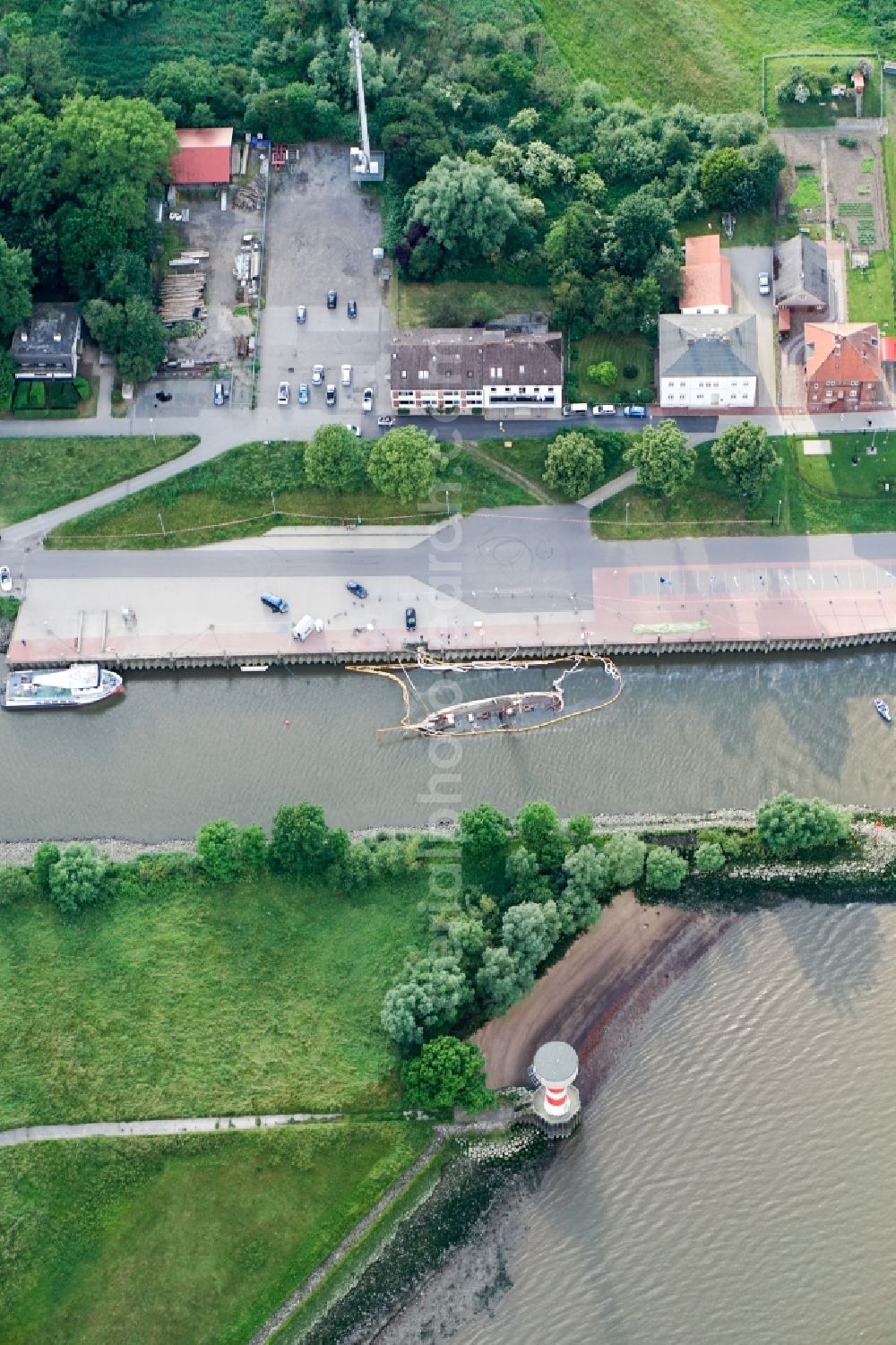 Stade from above - Salvage processing on ship - wreck of the historic two-master, the sunken pilot schooner No 5 Elbe in Stade in the state Lower Saxony, Germany