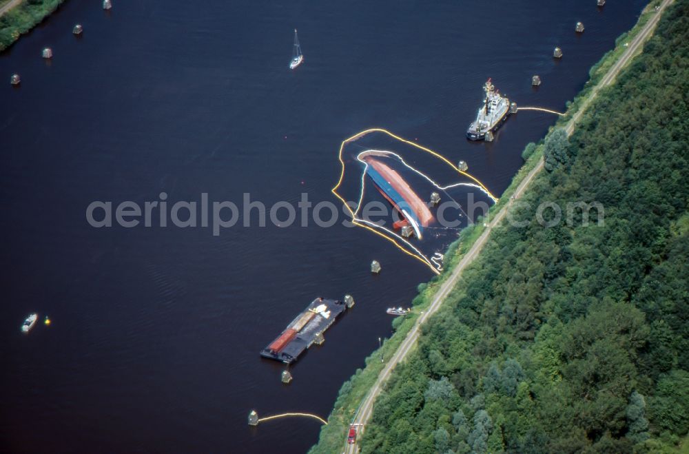 Aerial photograph Dückerswisch - Salvage processing on ship - wreck Scrap freighter UNO in the Canal in Dueckerswisch in the state Schleswig-Holstein, Germany