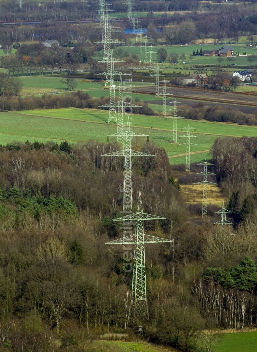 Werne OT Stockum from the bird's eye view: Power lines an overland route - high-voltage line in front of the coal power plant in the district of Stockum Gersteinwerk of Werne, North Rhine-Westphalia