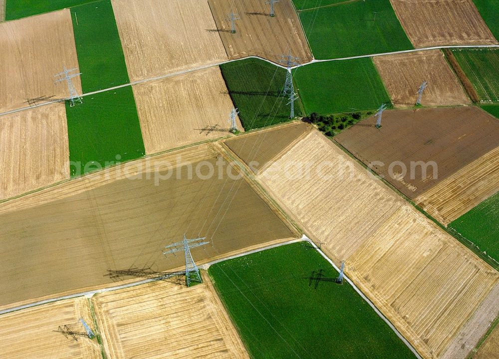 Aerial image Heilbronn - Transmission lines and acres in the county district of Heilbronn in the state of Baden-Württemberg. The high voltage power lines are set up along the fields and acres in the district and the region. The different sizes, geometries and structures of the various fields in summer are very well visible