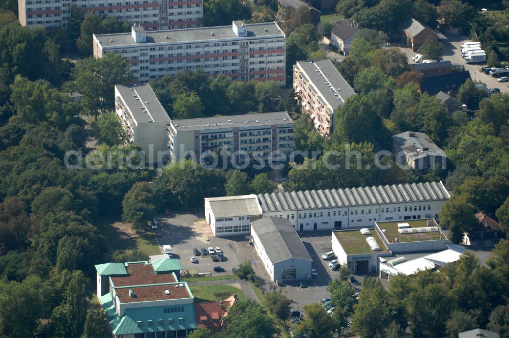 Berlin from the bird's eye view: Blick über das Wasserwerk Buch und das Autohaus Mercedes Benz, Heiz Hammer, an der Schwanebecker Chaussee, auf Mehrfamilienhäuser / Plattenbauten an der Straße Alt-Buch in Berlin-Buch.