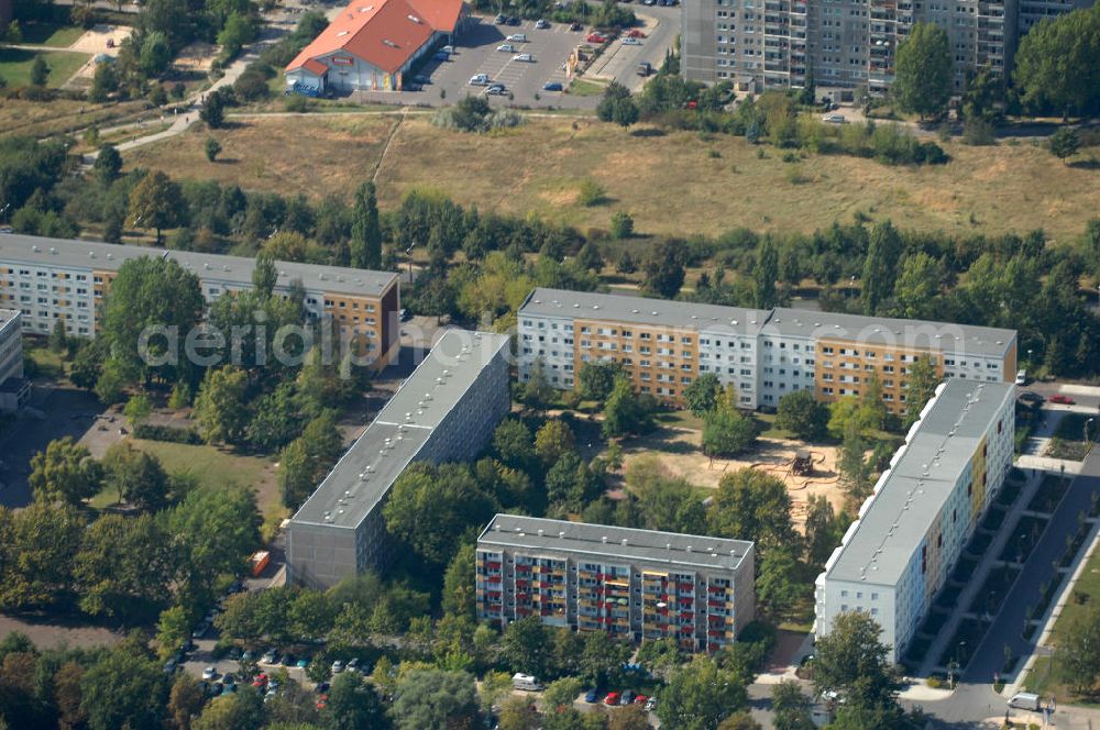 Aerial photograph Berlin - Blick auf Mehrfamilienhäuser / Plattenbauten an der Robert-Rössle-Straße Ecke Ernst-Ludwig-Heim-Straße Ecke Karower Chaussee in Berlin-Buch.