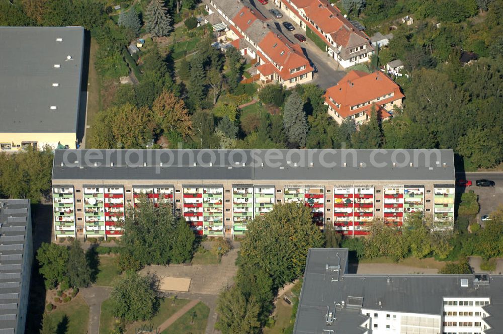 Aerial photograph Berlin - Blick auf Mehrfamilienhäuser / Plattenbauten an der Theodor-Brugsch-Straße in Berlin-Buch.