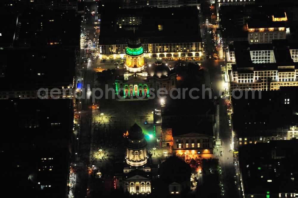 Aerial photograph Berlin - Nachtaufnahme: Blick auf den Gendarmenmarkt mit dem Französischen Dom, dem Deutschen Dom und dem von Karl Friedrich Schinkel erbauten Schauspielhaus mit Beleuchtung anläßlich des Festival of Lights. Night Shot: View at the Gendarmenmarkt with the French Cathedral, the German Cathedral and the theater, built by Karl Friedrich Schinkel with illumination at the Festival of Lights.