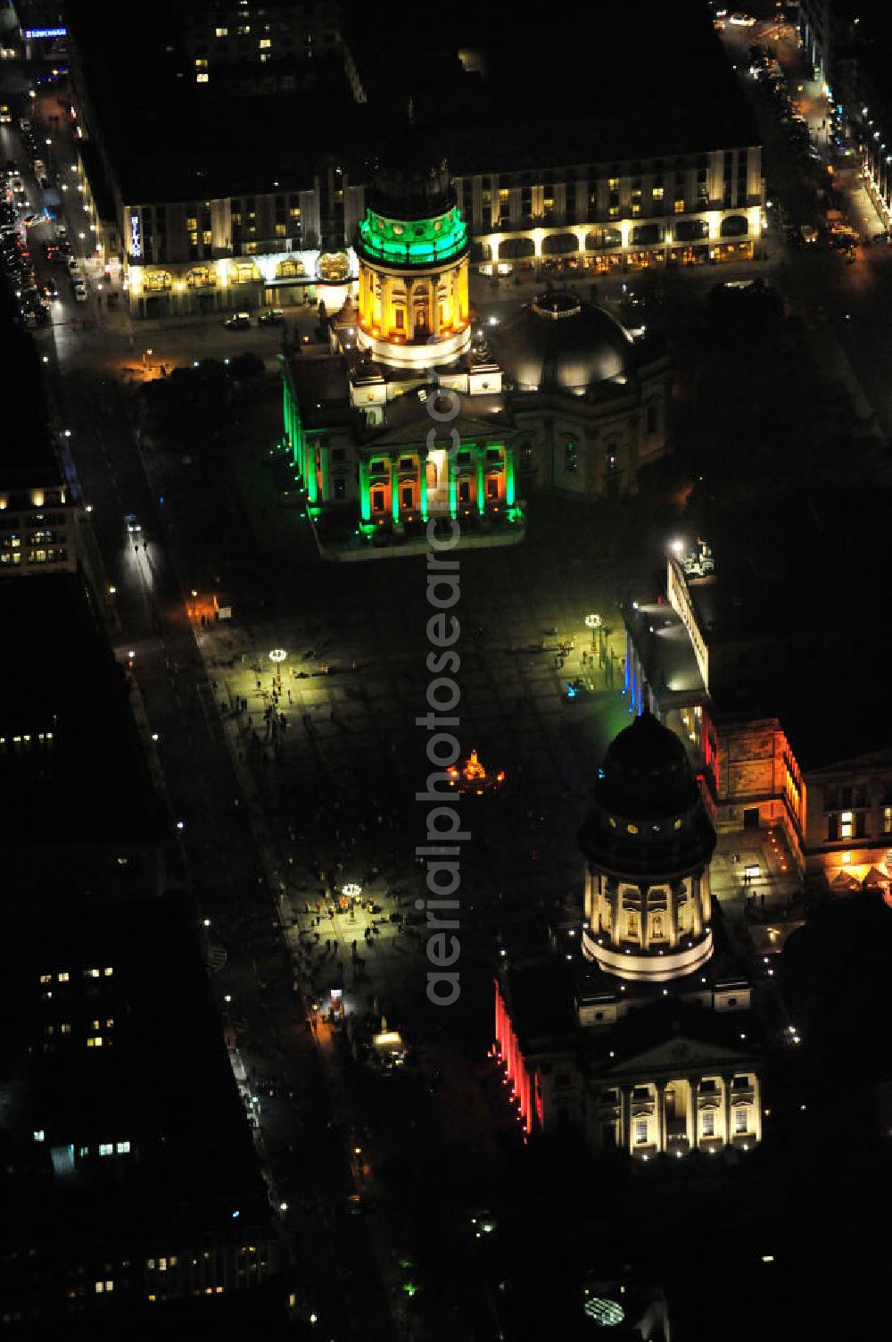 Berlin from above - Nachtaufnahme: Blick auf den Gendarmenmarkt mit dem Französischen Dom, dem Deutschen Dom und dem von Karl Friedrich Schinkel erbauten Schauspielhaus mit Beleuchtung anläßlich des Festival of Lights. Night Shot: View at the Gendarmenmarkt with the French Cathedral, the German Cathedral and the theater, built by Karl Friedrich Schinkel with illumination at the Festival of Lights.