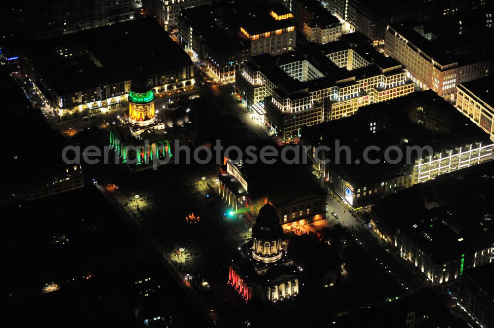 Berlin from the bird's eye view: Nachtaufnahme: Blick auf den Gendarmenmarkt mit dem Französischen Dom, dem Deutschen Dom und dem von Karl Friedrich Schinkel erbauten Schauspielhaus mit Beleuchtung anläßlich des Festival of Lights. Night Shot: View at the Gendarmenmarkt with the French Cathedral, the German Cathedral and the theater, built by Karl Friedrich Schinkel with illumination at the Festival of Lights.