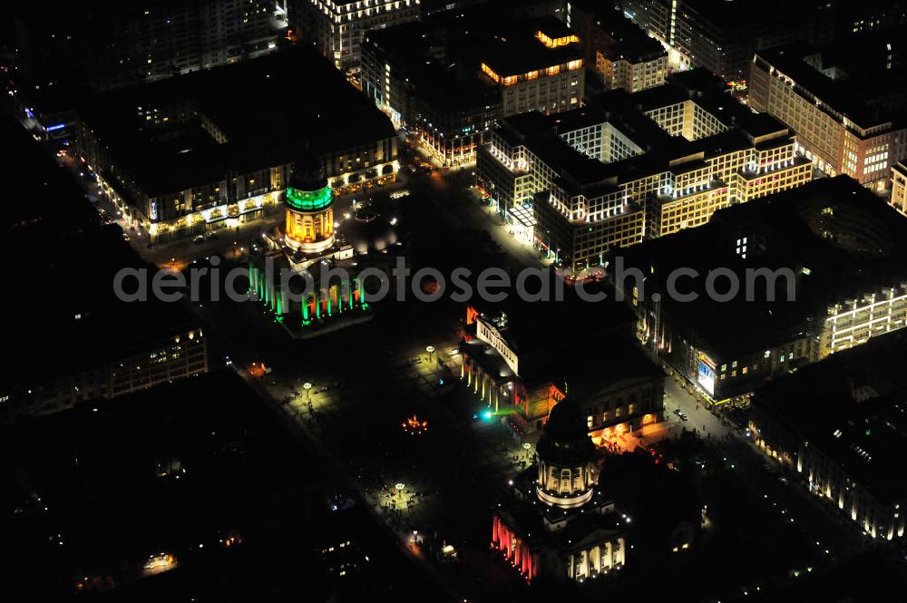 Aerial image Berlin - Nachtaufnahme: Blick auf den Gendarmenmarkt mit dem Französischen Dom, dem Deutschen Dom und dem von Karl Friedrich Schinkel erbauten Schauspielhaus mit Beleuchtung anläßlich des Festival of Lights. Night Shot: View at the Gendarmenmarkt with the French Cathedral, the German Cathedral and the theater, built by Karl Friedrich Schinkel with illumination at the Festival of Lights.