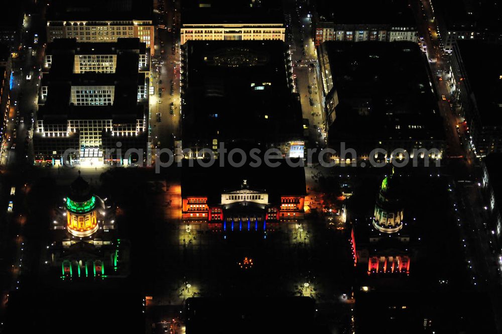 Berlin from the bird's eye view: Nachtaufnahme: Blick auf den Gendarmenmarkt mit dem Französischen Dom, dem Deutschen Dom und dem von Karl Friedrich Schinkel erbauten Schauspielhaus mit Beleuchtung anläßlich des Festival of Lights. Night Shot: View at the Gendarmenmarkt with the French Cathedral, the German Cathedral and the theater, built by Karl Friedrich Schinkel with illumination at the Festival of Lights.