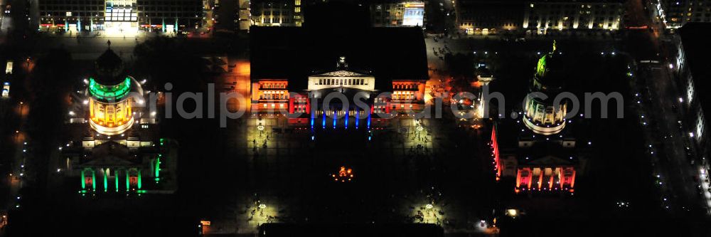 Aerial image Berlin - Nachtaufnahme: Blick auf den Gendarmenmarkt mit dem Französischen Dom, dem Deutschen Dom und dem von Karl Friedrich Schinkel erbauten Schauspielhaus mit Beleuchtung anläßlich des Festival of Lights. Night Shot: View at the Gendarmenmarkt with the French Cathedral, the German Cathedral and the theater, built by Karl Friedrich Schinkel with illumination at the Festival of Lights.