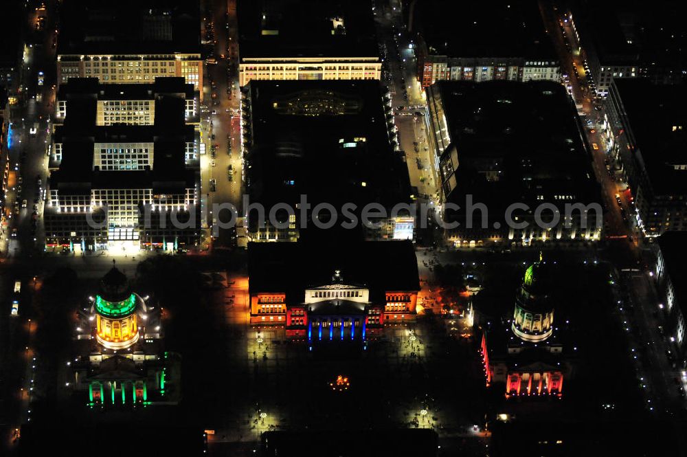 Aerial photograph Berlin - Nachtaufnahme: Blick auf den Gendarmenmarkt mit dem Französischen Dom, dem Deutschen Dom und dem von Karl Friedrich Schinkel erbauten Schauspielhaus mit Beleuchtung anläßlich des Festival of Lights. Night Shot: View at the Gendarmenmarkt with the French Cathedral, the German Cathedral and the theater, built by Karl Friedrich Schinkel with illumination at the Festival of Lights.