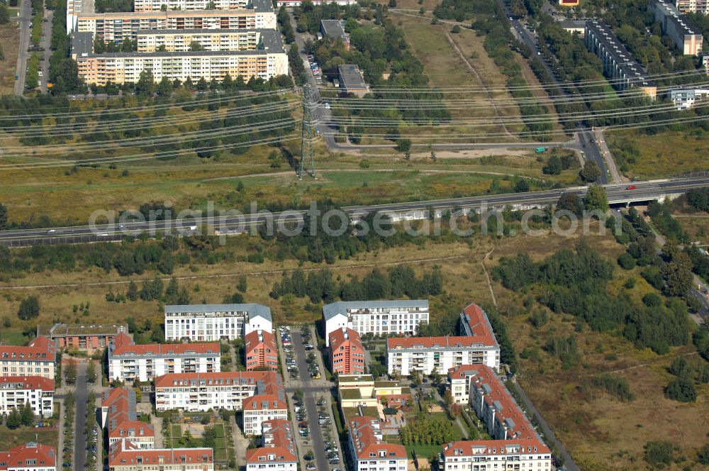 Berlin from the bird's eye view: Blick auf Mehrfamilienhäuser an der Pfannschmidtstraße Ecke Beerbaumstraße Nahe des Berliner Ring / Autobahn A 10 / E 55 im Wohngebiet / Neubaugebiet Karow-Nord in Richtung Plattenbauten an der Driedrich-Richter-Straße in Buch.