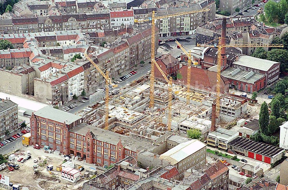 Aerial photograph Berlin Prenzlauer Berg - 06.09.1995 Berlin, Neubau Wohn - und Geschäftsbauten Erich-Weinert-Strasse, Ecke Greifswalder Straße