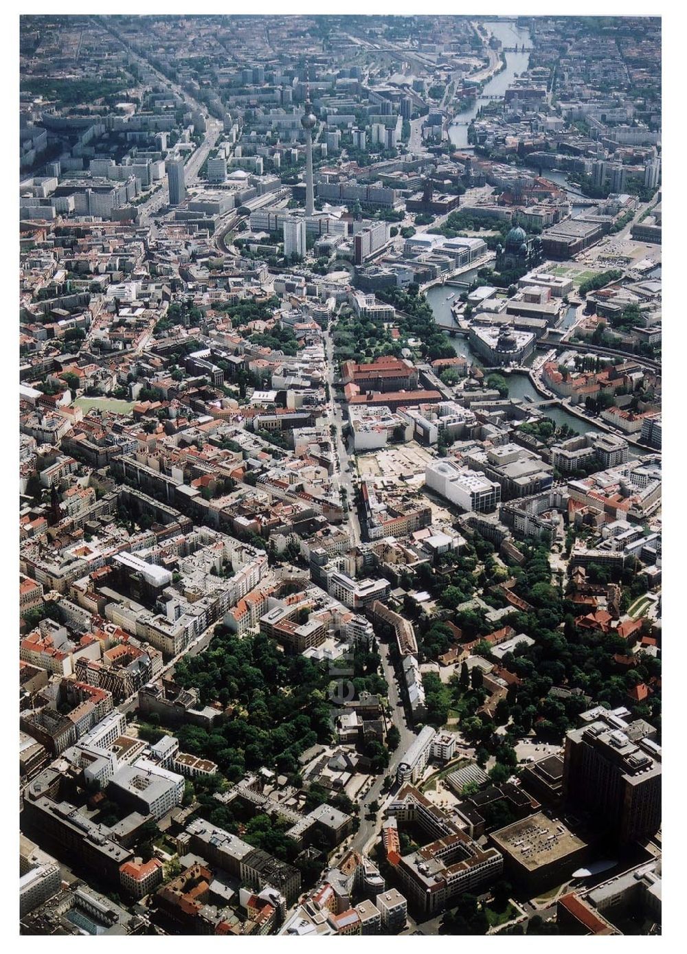 Berlin Mitte from the bird's eye view: 31.05.2004 Berlin Mitte, Blick auf die Gebäude der Hessische Straße 11, 10115 Berlin, der PRIMA Wohnbau Gesellschaft. Im Hintergrund das Stadzentrum von Berlin - Mitte PRIMA Wohnbauten Privatisierungs-Managemant GmbH Lichtenberg, Kurfürstendamm 32, 10719 Berlin, Tel.: 212497-0, Fax.: 2110170,