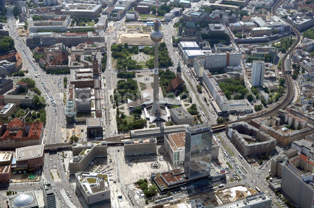 Aerial photograph Berlin - Blick auf den Berliner Alexanderplatz mit dem Park Inn Hotel Hochhaus und dem KAUFHOF am Alex. Das unmittelbar am Fernsehturm gelegene Areal wurde in den letzten Jahren erheblich um- und ausgebaut.