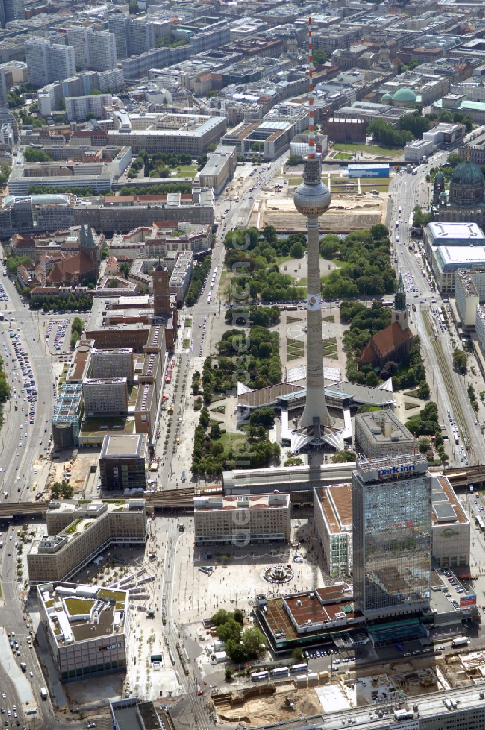 Berlin from above - Blick auf den Berliner Alexanderplatz mit dem Park Inn Hotel Hochhaus und dem KAUFHOF am Alex. Das unmittelbar am Fernsehturm gelegene Areal wurde in den letzten Jahren erheblich um- und ausgebaut.