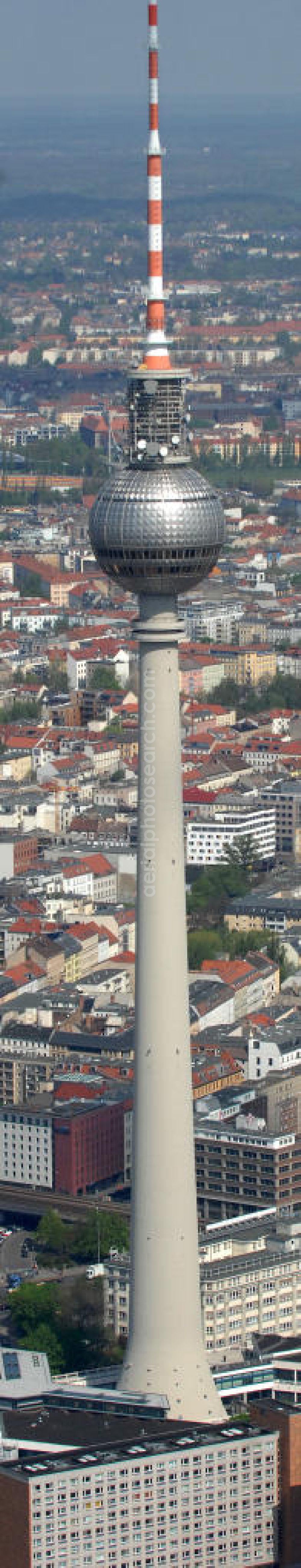 Aerial image Berlin - Blick auf Deutschlands höchstes Bauwerk , den Fernsehturm im Zentrum der deutschen Hauptstadt. Der Berliner Fernsehturm ist mit 368 Meter das höchste Bauwerk Deutschlands und das vierthöchste nicht abgespannte Bauwerk Europas. View of Germany's tallest structure, the TV tower in the center of the German capital. The Berlin TV Tower is 368 meters the tallest building in Germany and the fourth highest building in Europe is not guyed.