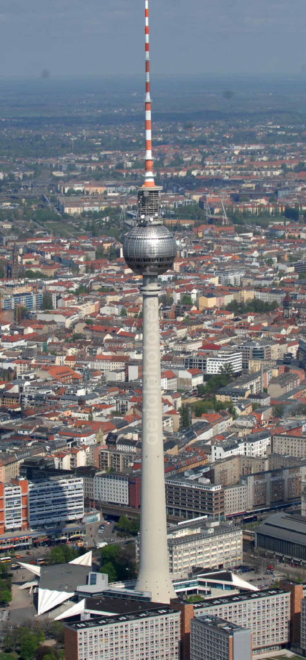 Berlin from above - Blick auf Deutschlands höchstes Bauwerk , den Fernsehturm im Zentrum der deutschen Hauptstadt. Der Berliner Fernsehturm ist mit 368 Meter das höchste Bauwerk Deutschlands und das vierthöchste nicht abgespannte Bauwerk Europas. View of Germany's tallest structure, the TV tower in the center of the German capital. The Berlin TV Tower is 368 meters the tallest building in Germany and the fourth highest building in Europe is not guyed.