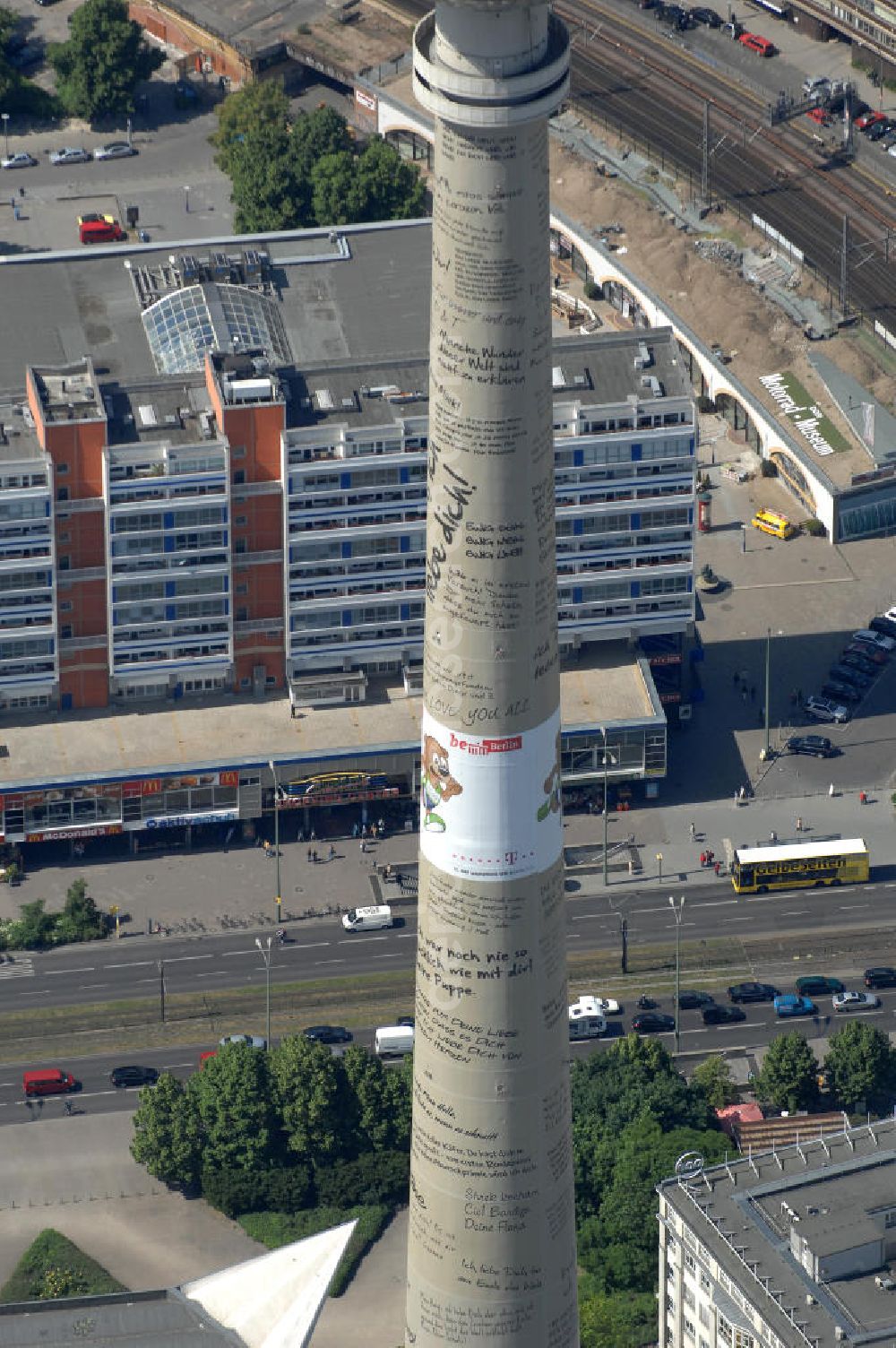 Aerial image Berlin - Industriekletterer haben den 368 Meter hohen Berliner Fernsehturm mit insgesamt 15 Vinylbannern versehen auf denen auch 70 Liebes-Botschaften und ein Heiratsantrag zu lesen sind.