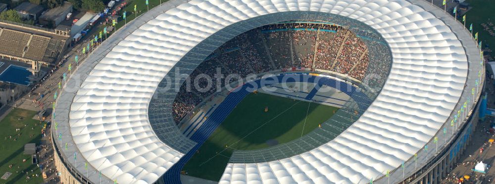 Aerial image Berlin - Blick auf das Berliner Olympiastadion zur Abschlußfeier der Leichtathletik WM 2009. Vom 15. bis 23. August 2009 fanden in Berlin das weltgrößte Sportevent des Jahres 2009 statt - die Leichtathletik Weltmeisterschaft. Rund 1.800 Top-Athleten aus den 213 Mitgliedsverbänden des Weltverbandes IAAF treten im Kampf um die Medaillen in 47 Disziplinen im Berliner Olympiastadion an.