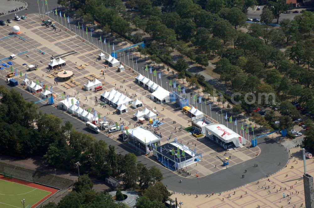 Aerial photograph Berlin - Blick auf das Berliner Olympiastadion, am Tag der Eröffnung der Leichtathletik WM 2009. Vom 15. bis 23. August 2009 findet in Berlin das weltgrößte Sportevent des Jahres 2009 statt - die Leichtathletik Weltmeisterschaft. Rund 1.800 Top-Athleten aus den 213 Mitgliedsverbänden des Weltverbandes IAAF treten im Kampf um die Medaillen in 47 Disziplinen im Berliner Olympiastadion an.