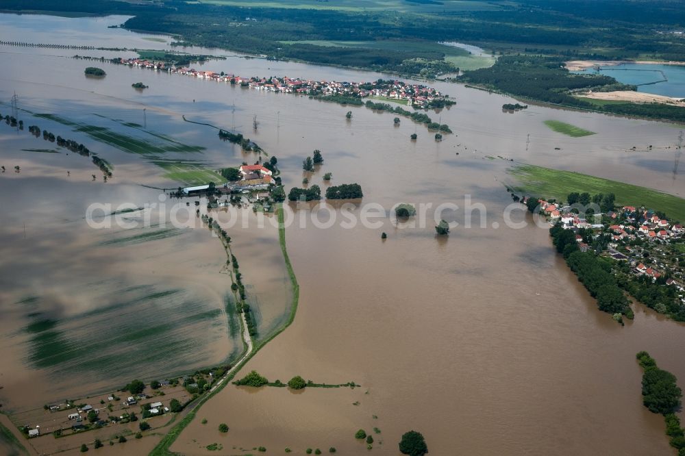 Riesa from above - Flooding due to high water on the North and South shore of the Elbe river at the city of Riesa in the state of Saxony. Affected are farms, industrial buildings and residential areas