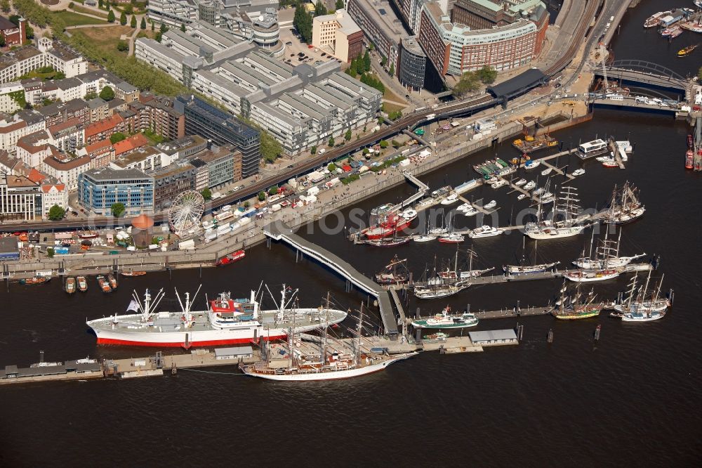 Aerial image Hamburg - Ueberseebruecke at the harbor in Hamburg. Inter alia, the docks are berth for the ships Cap San Diego which is a museum and Feuerschiff, which is a restaurant