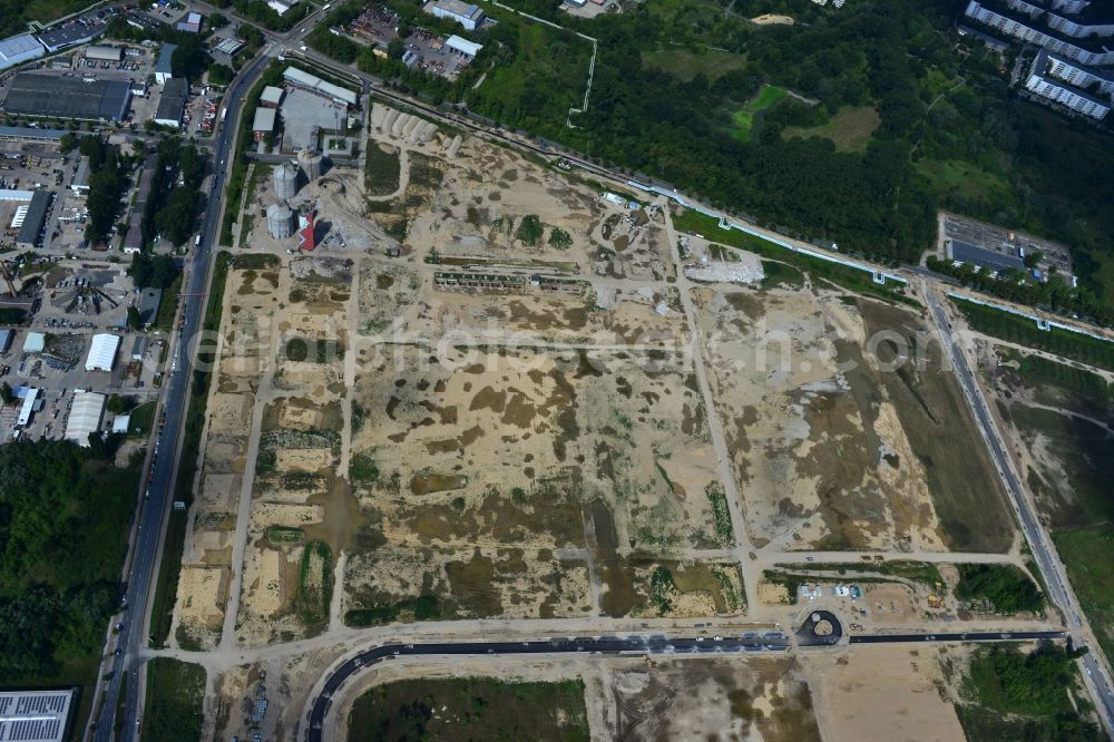 Berlin Falkenberg Hohenschönhausen from the bird's eye view: View Cleared site on the ruins of the digesters and clarifiers of Falkenberg treatment plant in the district Hohenschonhausen - Marzahn in Berlin. The area is a developing area with commercial and industrial development to the CleanTech Business Park Berlin - Marzahn be expanded